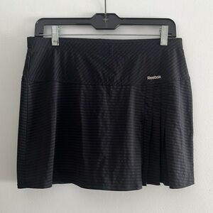 Reebok active skort with pin stripe and rouching